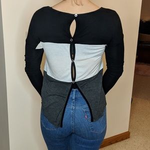 Partially open back shirt